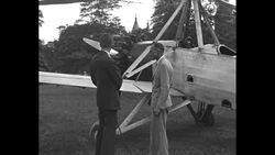 Pilot James Ray talks with men near C.8W autogiro aircraft on National Mall News Clip