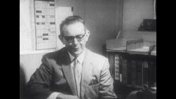 Television Executive Watches Television Programmes on Three Different Monitors Stock Footage