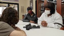 People buying guns in a gun shop News Clip