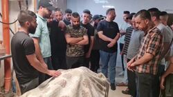 CLEAN : Mourners gather around body of Palestinian killed in Israeli WBank raid News Clip