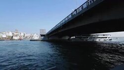 Liner turns under bridge, passanger transportation, Bosporus cruise in Istanbul Stock Footage