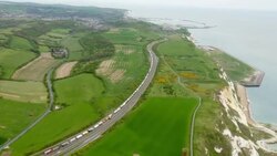 Stock shots of freight lorries queueing on the A2 for the Port of Dover News Clip