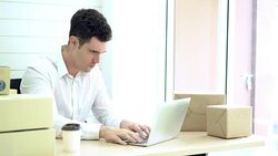 Man working to hard using laptop check packing list order. Packing box, shipping parcel package and Delivery Shopping online. Stock Footage