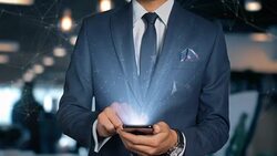 Businessman With Mobile Phone Opens Hologram HUD Interface and Touches Word - MONOPOLY Stock Footage