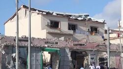CLEAN : People clear rubble day after twin blasts rock Somali capital News Clip