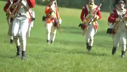 British Revolutionary War soldiers firing muskets on battlefield Stock Footage