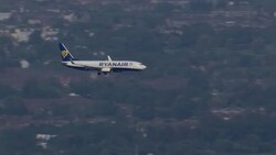 Aerials of Liverpool John Lennon Airport with Ryanair plane landing News Clip