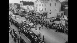 Atlantic Ocean, 1952: A few weeks after his shipwreck, Captain Carlsen is welcomed with a parade in his hometown of Woodbridge, New Jersey Stock Footage