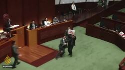 China defends rule that led to Hong Kong politicians' dismissal News Clip