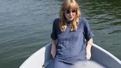 Beautiful young woman relaxing on tourboat Stock Footage