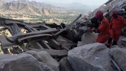 CLEAN : Rescuers search for bodies in rubble after Pakistan mine rockslide News Clip