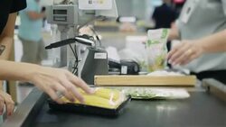 Barcode scanner at shopping cash register Stock Footage