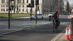 Light traffic travelling through Westminster during the UK Lockdown News Clip