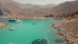 Soar Above Symi: Discover Greece's Hidden Coastal Jewel Stock Footage