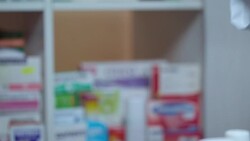 Pharmacist hand give blister pack to customer hand. Buying medicaments Stock Footage