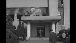 Economic Cooperation Administration head Foster inspects destruction of buildings on inspection tour in South Korea during Korean War News Clip