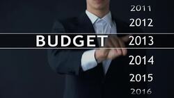 2017 budget, businessman selects file on virtual screen, annual financial report Stock Footage