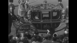Queen Elizabeth goes to Parliament to open session in 1953 News Clip