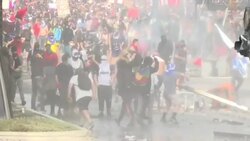 CLEAN : Clashes between police and demonstrators in Chile continue News Clip
