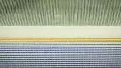 Colorful Threads on a loom in  weaving loom machine in textile factory Stock Footage