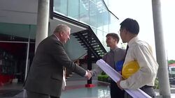 Handshake of businessman demonstrating their agreement to sign agreement or contract between their firms / companies / enterprises. Stock Footage