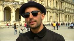 French artist JR makes the Louvre disappear News Clip