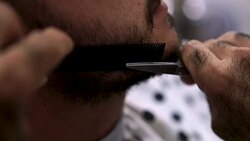 Barber Cutting Beard Stock Footage