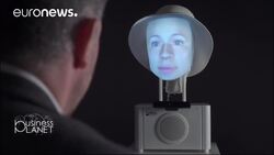 Socially-intelligent robot steals the show News Clip