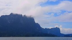 view of landscape limestone mountain rang and green forest with water lake Stock Footage