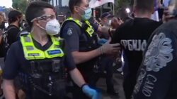 CLEAN : Australia police use pepper spray to disperse Djokovic supporters News Clip