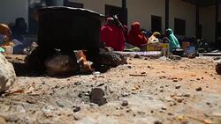 Somalis fleeing al-Shabab attacks and floods shelter in Mogadishu suburb Stock Footage
