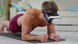 Shirtless Man Performing Forearm Plank Stock Footage
