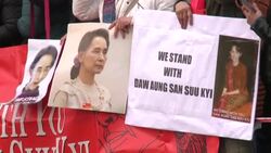 CLEAN : Aung San Suu Kyi supporters protest in front of the ICJ News Clip
