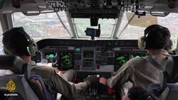 Family, friends of Indonesia plane crash passengers await news News Clip