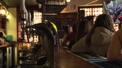 CLEAN : Queen Elizabeth II's funeral: mourners in Paris gather at pub to pay respects News Clip