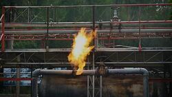 Fire flames from gas pipe leak, Fire extinguishers at Industry factory Stock Footage