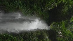 Vertical and Slow motion of waterfall in rainforest. Stock Footage