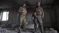 CLEAN : In a destroyed Donbas town, Ukrainian soldiers observe separatist positions News Clip