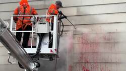 Workers clean pro-Palestinian graffiti from Department of Foreign Affairs building in Dublin News Clip