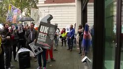 Assange Supporters protestering outside of court News Clip
