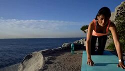 Beautiful latin american young woman saluting the sun during sunrise - Yoga concepts Stock Footage