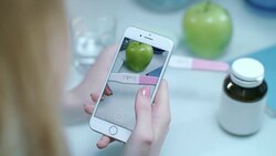 Woman taking mobie photo of positive pregnacy test. Pregnancy concept Stock Footage
