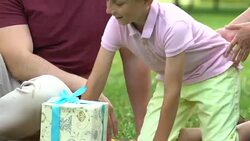 Loving wife and son congratulating father on birthday, perfect family relations Stock Footage