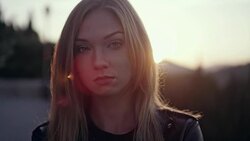 Beautiful girl posing in the sunlight. Sadness Stock Footage