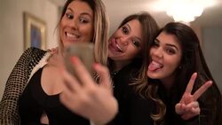 Girls taking a selfie house party Stock Footage