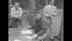 Stevenson and Eisenhower campaigns; Stevenson in cabin in woods; Eisenhower with Western governors in Boise News Clip