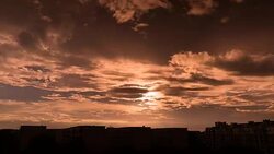 Cityscape cloudscape at sunset 4K UHD Stock Footage