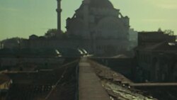 WIDE ANGLE OF MOSQUE, POV FROM SPANISH TILE ROOFTOP. COULD BE SULEYMANIYE MOSQUE. DOMES. Stock Footage