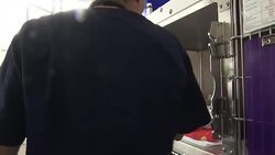 Puppy found in handbag hanging on door of charity shop Stock Footage