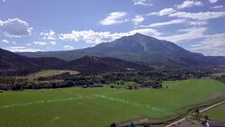 Aerial View of Mt. Sopris near Aspen Colorado in the Fall Stock Footage